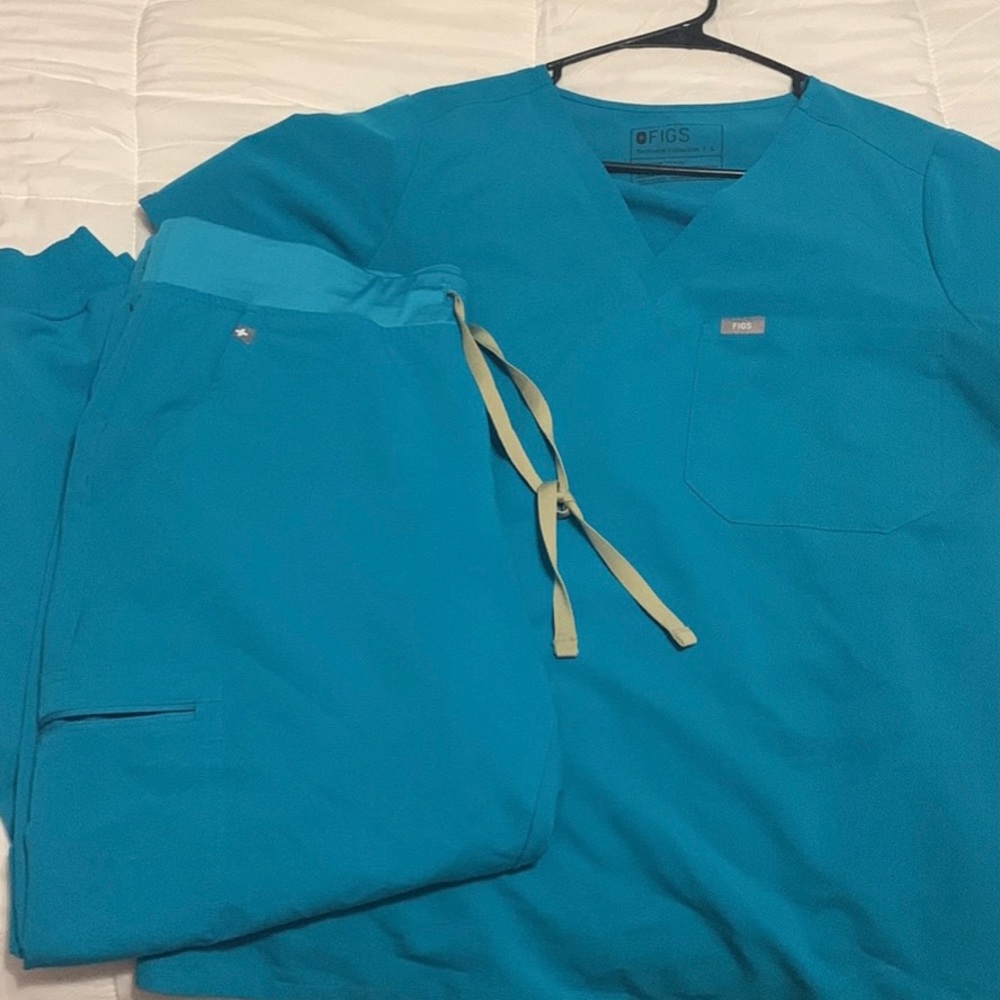 Figs Teal Catarina/Zamora. Used but in good condition.